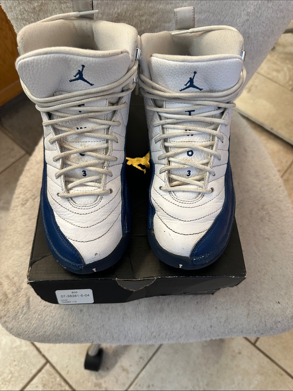 Size 6Y used Jordan 12 Kids White and Navy High-Top Sneakers